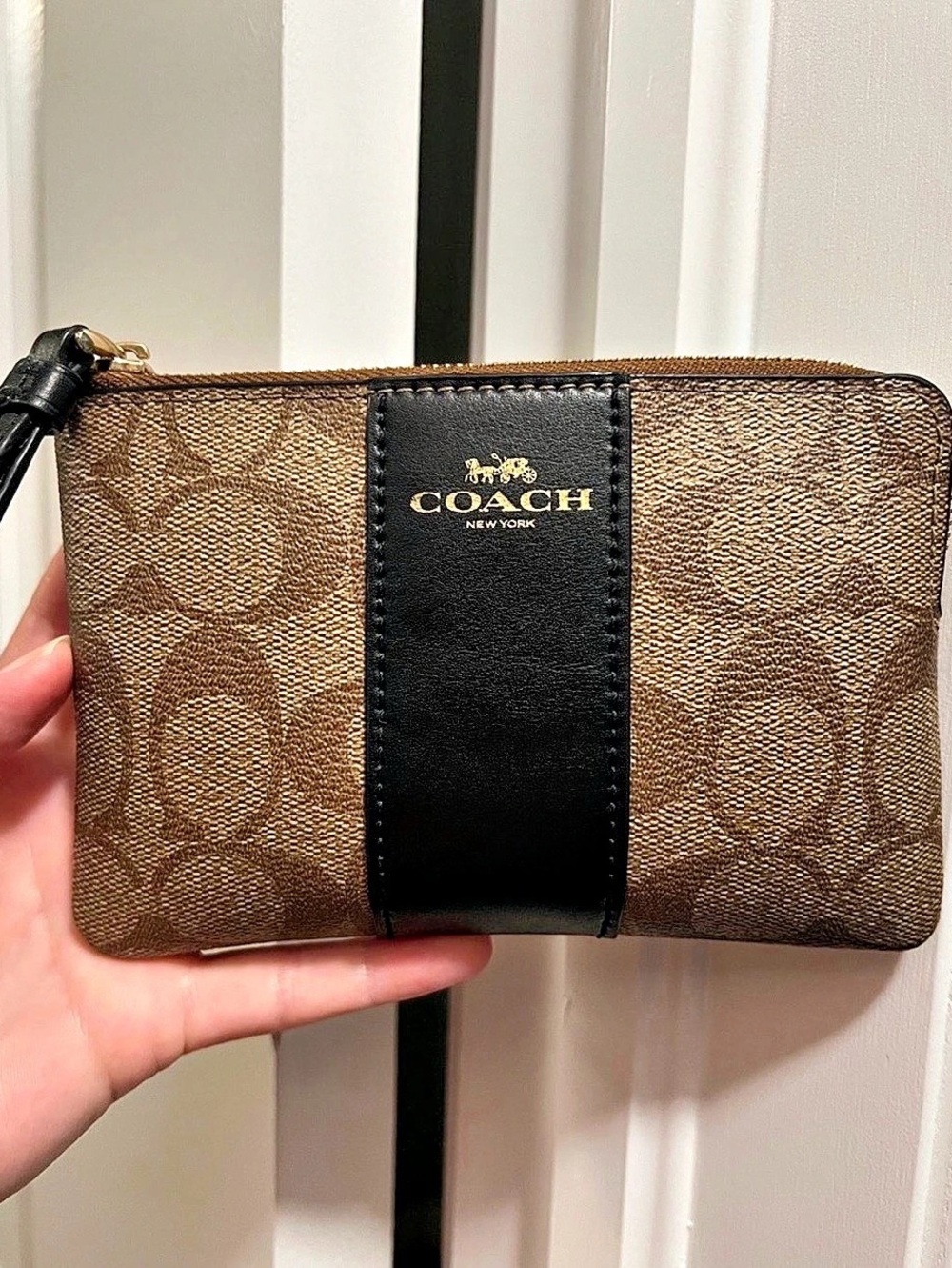 Coach Corner Zip Wristlet In Signature Canvas With Stripe Brown & Black